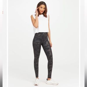 Spanx leggings size M. Faux leather camo